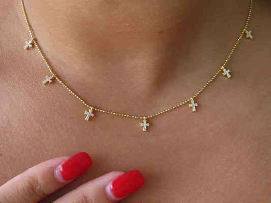 'TINY CROSS NECKLACE'