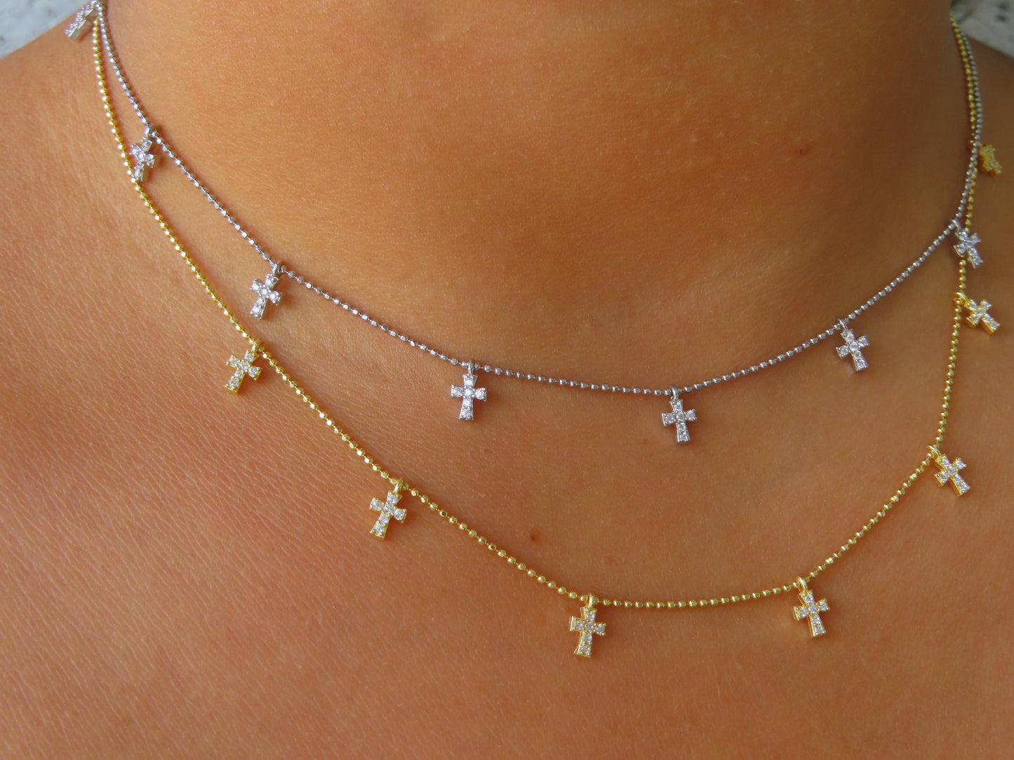 'TINY CROSS NECKLACE'