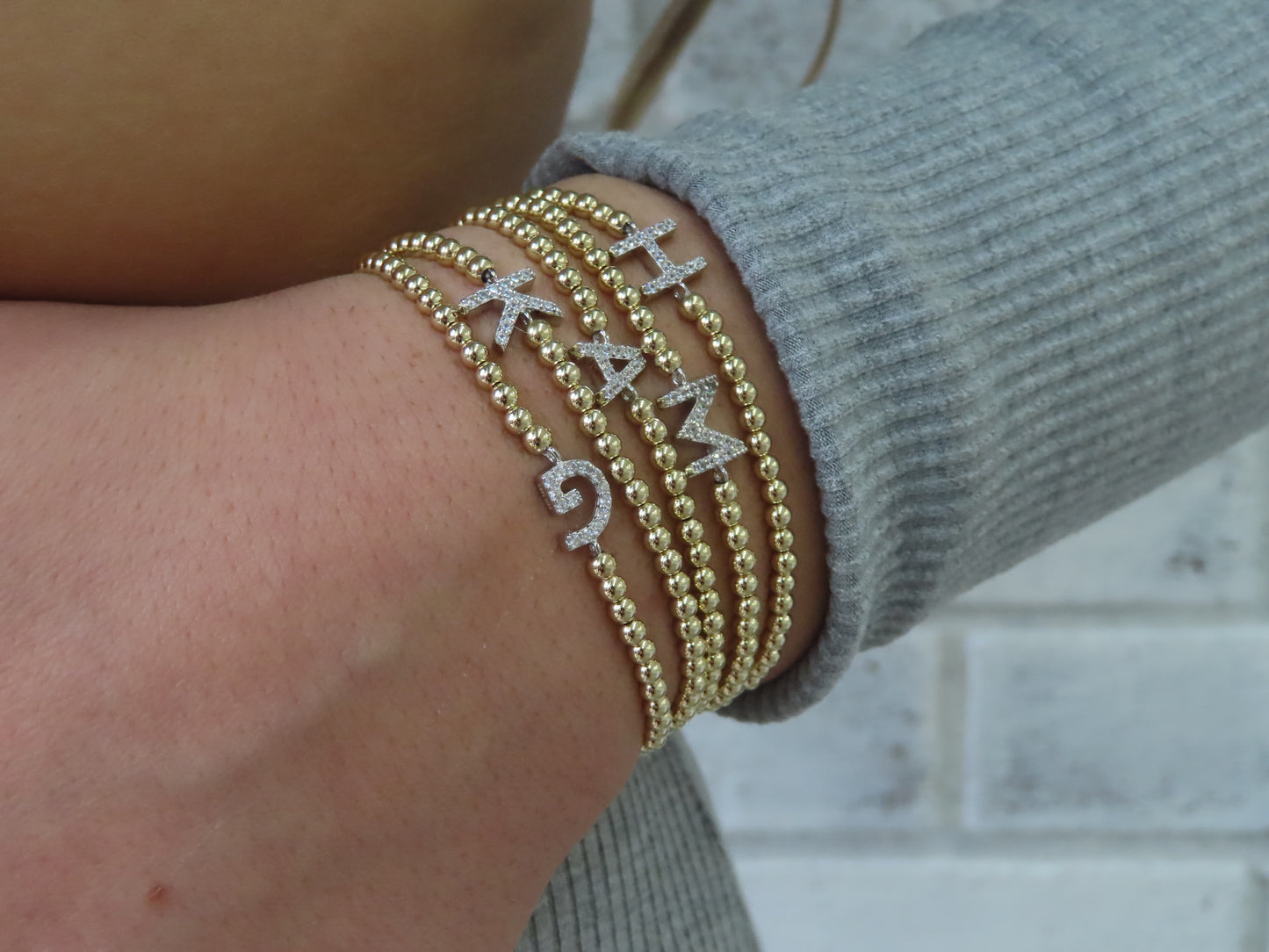 'PAVÉ LETTER BALL BRACELET'